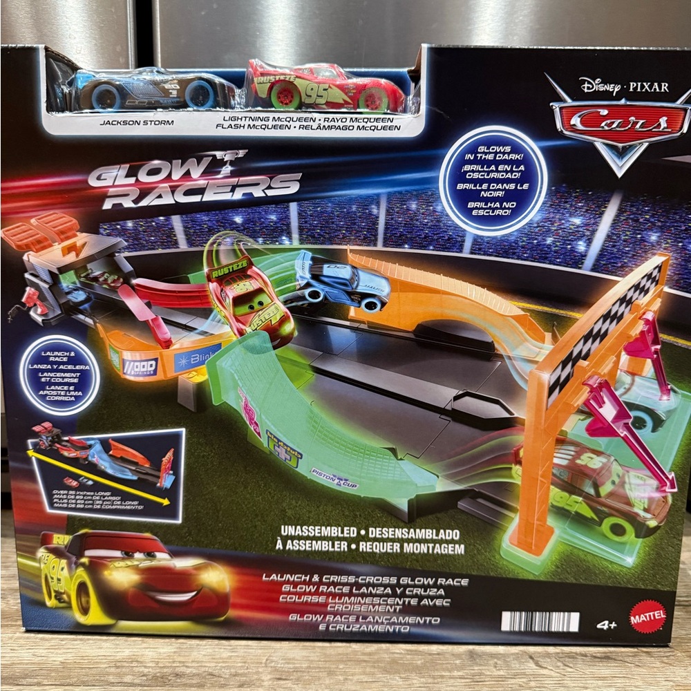 New in Box Disney and Pixar Cars Glow Racers
Launch & Criss-Cross Playset